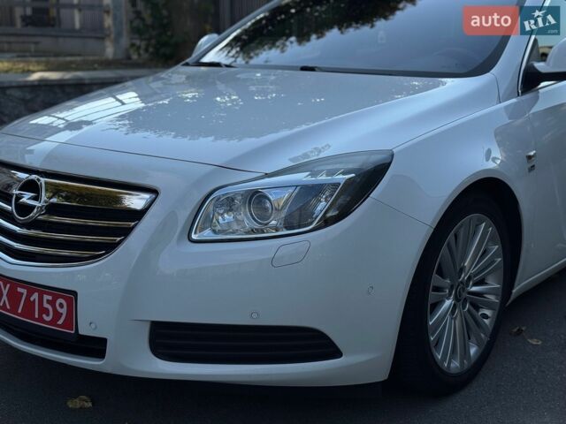 Белый Опель Инсигния, объемом двигателя 2 л и пробегом 130 тыс. км за 9300 $, фото 34 на Automoto.ua
