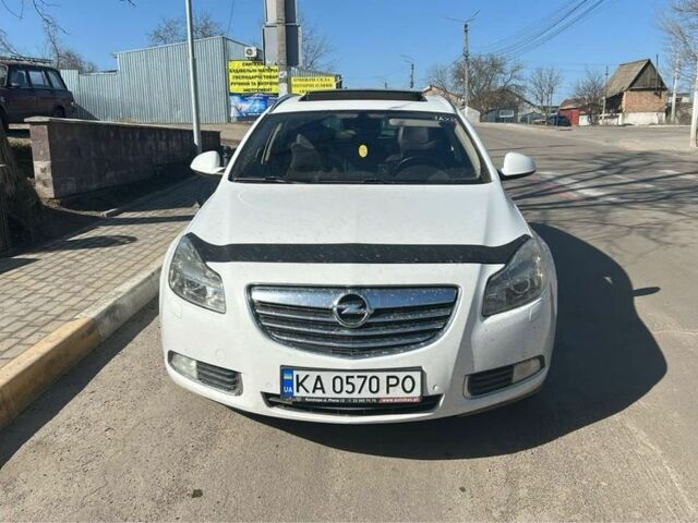 Білий Опель Інсігнія, об'ємом двигуна 2 л та пробігом 3 тис. км за 8600 $, фото 1 на Automoto.ua