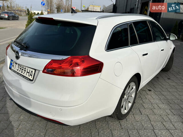 Білий Опель Інсігнія, об'ємом двигуна 1.96 л та пробігом 141 тис. км за 9800 $, фото 6 на Automoto.ua