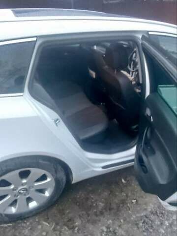 Білий Опель Інсігнія, об'ємом двигуна 1.96 л та пробігом 318 тис. км за 7000 $, фото 11 на Automoto.ua