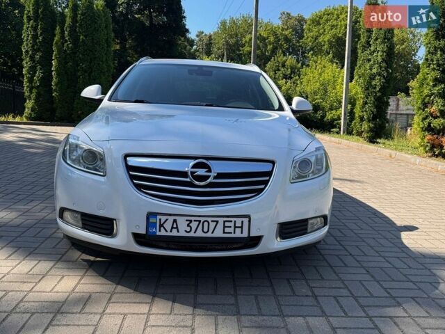 Білий Опель Інсігнія, об'ємом двигуна 2 л та пробігом 256 тис. км за 7999 $, фото 20 на Automoto.ua