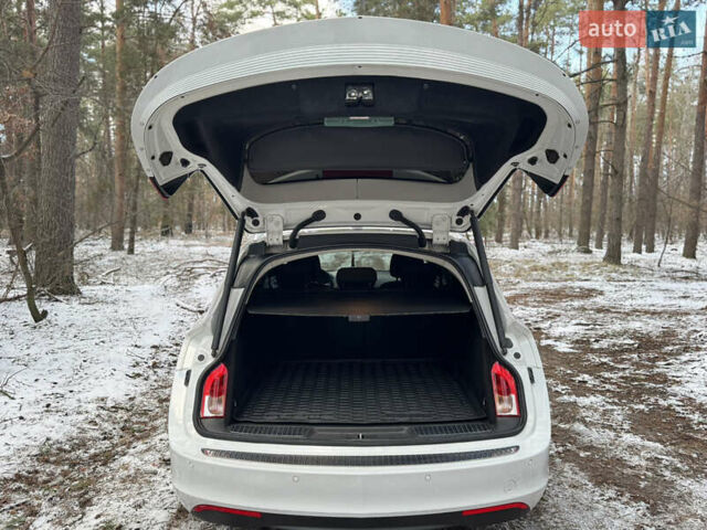 Белый Опель Инсигния, объемом двигателя 2 л и пробегом 317 тыс. км за 8700 $, фото 13 на Automoto.ua