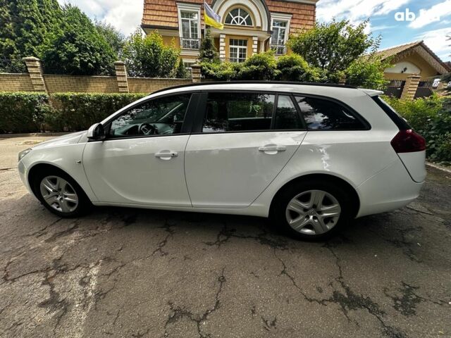 Белый Опель Инсигния, объемом двигателя 2 л и пробегом 211 тыс. км за 8590 $, фото 7 на Automoto.ua