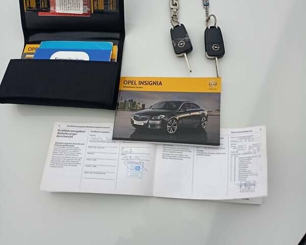 Белый Опель Инсигния, объемом двигателя 1.96 л и пробегом 265 тыс. км за 10300 $, фото 23 на Automoto.ua