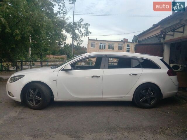 Білий Опель Інсігнія, об'ємом двигуна 1.96 л та пробігом 224 тис. км за 8500 $, фото 16 на Automoto.ua