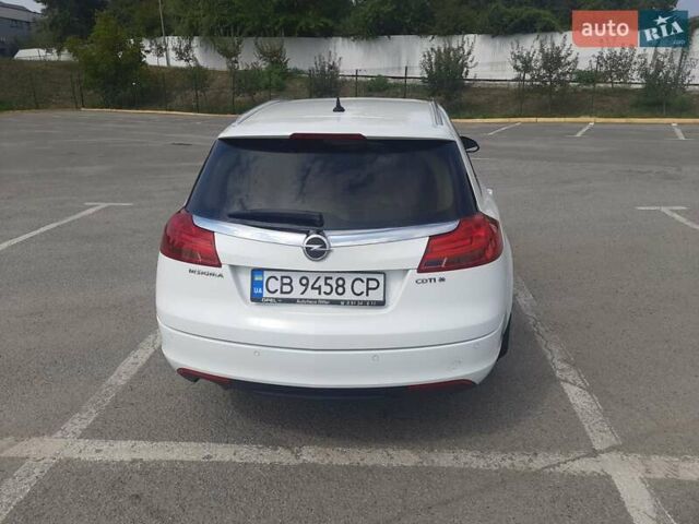 Білий Опель Інсігнія, об'ємом двигуна 1.96 л та пробігом 210 тис. км за 9500 $, фото 4 на Automoto.ua