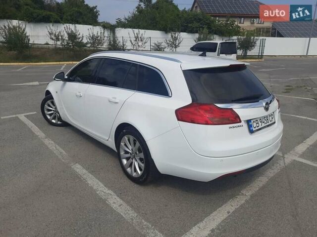 Білий Опель Інсігнія, об'ємом двигуна 1.96 л та пробігом 210 тис. км за 9500 $, фото 5 на Automoto.ua