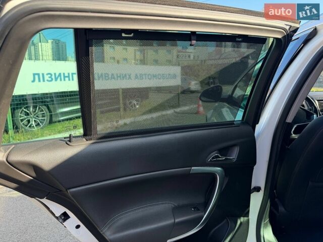 Білий Опель Інсігнія, об'ємом двигуна 1.96 л та пробігом 274 тис. км за 8990 $, фото 8 на Automoto.ua