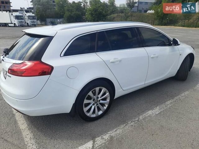 Білий Опель Інсігнія, об'ємом двигуна 1.96 л та пробігом 210 тис. км за 9500 $, фото 3 на Automoto.ua