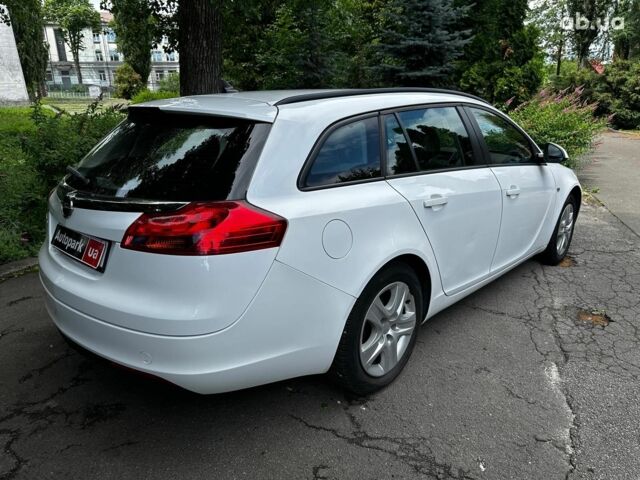 Белый Опель Инсигния, объемом двигателя 2 л и пробегом 211 тыс. км за 8590 $, фото 4 на Automoto.ua