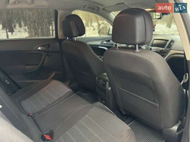 Белый Опель Инсигния, объемом двигателя 2 л и пробегом 317 тыс. км за 8700 $, фото 12 на Automoto.ua