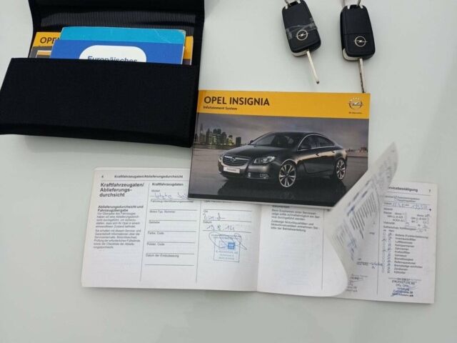 Білий Опель Інсігнія, об'ємом двигуна 1.96 л та пробігом 265 тис. км за 10300 $, фото 22 на Automoto.ua