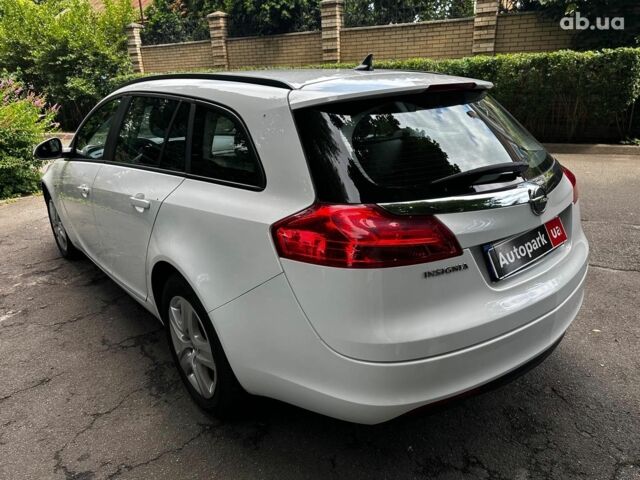Белый Опель Инсигния, объемом двигателя 2 л и пробегом 211 тыс. км за 8590 $, фото 6 на Automoto.ua