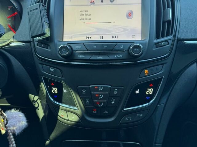 Білий Опель Інсігнія, об'ємом двигуна 2 л та пробігом 270 тис. км за 9000 $, фото 10 на Automoto.ua