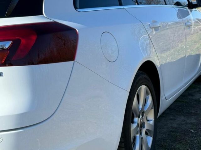 Білий Опель Інсігнія, об'ємом двигуна 2 л та пробігом 270 тис. км за 9000 $, фото 4 на Automoto.ua