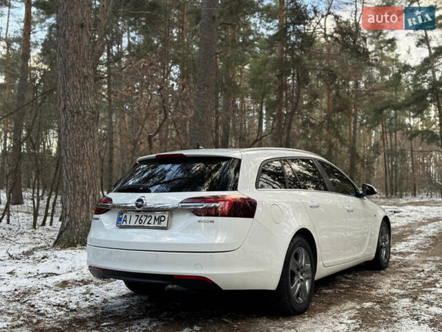 Белый Опель Инсигния, объемом двигателя 2 л и пробегом 317 тыс. км за 8700 $, фото 4 на Automoto.ua