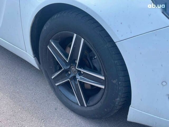 Белый Опель Инсигния, объемом двигателя 2 л и пробегом 297 тыс. км за 10700 $, фото 17 на Automoto.ua