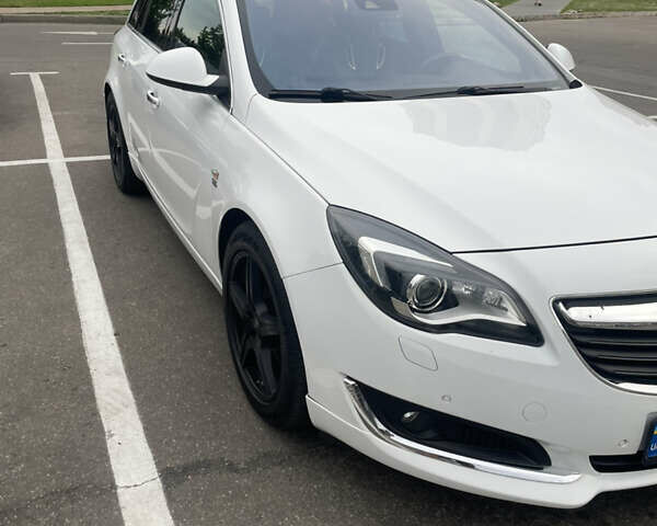 Білий Опель Інсігнія, об'ємом двигуна 2 л та пробігом 200 тис. км за 12500 $, фото 14 на Automoto.ua