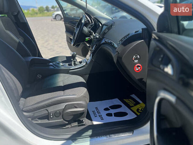 Білий Опель Інсігнія, об'ємом двигуна 2 л та пробігом 334 тис. км за 9150 $, фото 25 на Automoto.ua