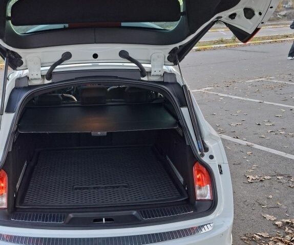 Белый Опель Инсигния, объемом двигателя 2 л и пробегом 260 тыс. км за 13200 $, фото 7 на Automoto.ua