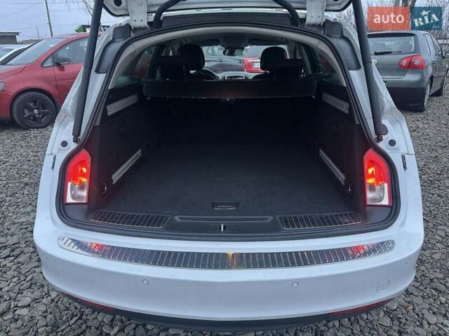 Белый Опель Инсигния, объемом двигателя 2 л и пробегом 288 тыс. км за 8800 $, фото 8 на Automoto.ua