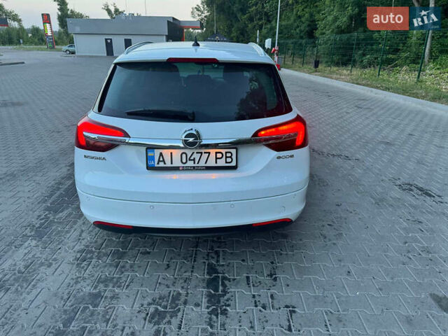 Белый Опель Инсигния, объемом двигателя 2 л и пробегом 281 тыс. км за 10000 $, фото 4 на Automoto.ua