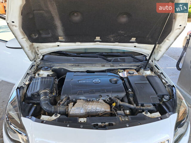 Белый Опель Инсигния, объемом двигателя 1.96 л и пробегом 204 тыс. км за 9700 $, фото 20 на Automoto.ua