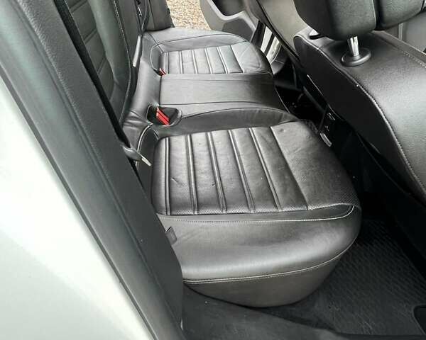 Білий Опель Інсігнія, об'ємом двигуна 2 л та пробігом 191 тис. км за 8200 $, фото 24 на Automoto.ua