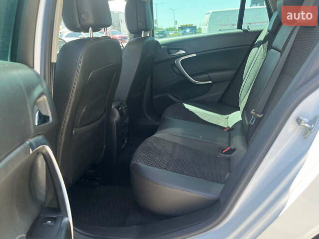 Білий Опель Інсігнія, об'ємом двигуна 2 л та пробігом 334 тис. км за 9150 $, фото 29 на Automoto.ua