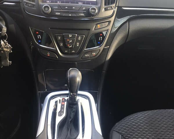 Білий Опель Інсігнія, об'ємом двигуна 2 л та пробігом 210 тис. км за 10800 $, фото 13 на Automoto.ua