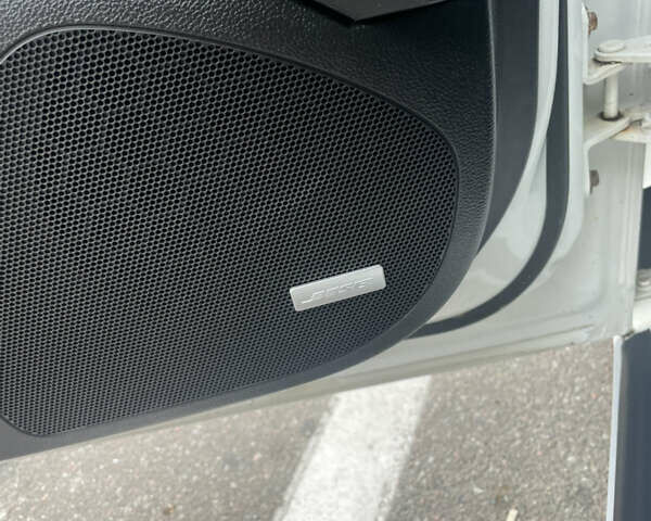 Білий Опель Інсігнія, об'ємом двигуна 2 л та пробігом 200 тис. км за 12500 $, фото 17 на Automoto.ua