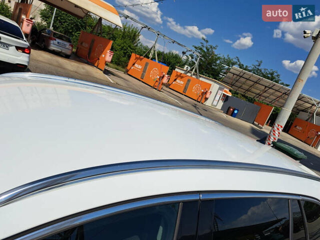 Белый Опель Инсигния, объемом двигателя 1.96 л и пробегом 204 тыс. км за 9700 $, фото 6 на Automoto.ua