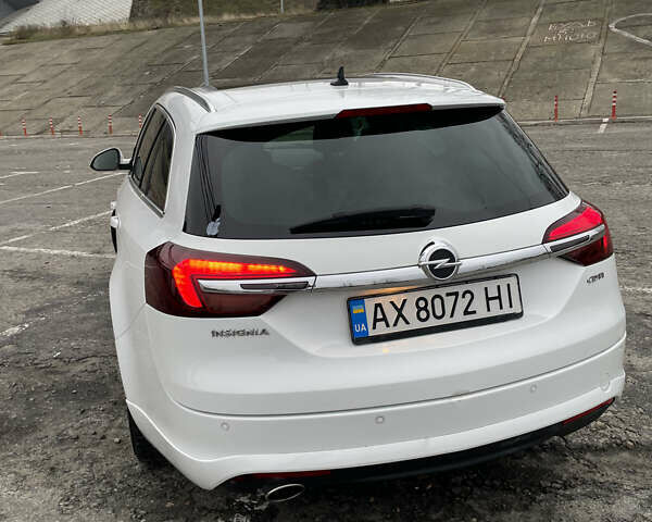 Білий Опель Інсігнія, об'ємом двигуна 1.96 л та пробігом 298 тис. км за 10800 $, фото 11 на Automoto.ua