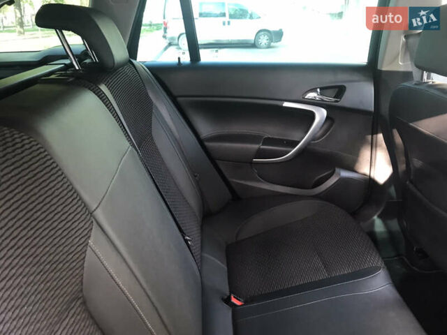 Білий Опель Інсігнія, об'ємом двигуна 2 л та пробігом 210 тис. км за 10800 $, фото 21 на Automoto.ua