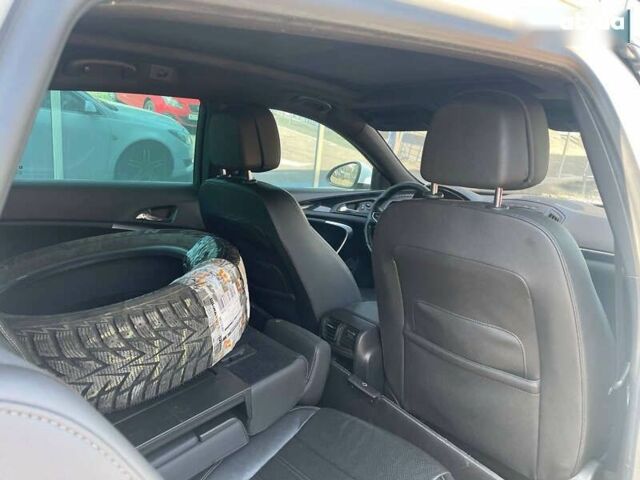 Белый Опель Инсигния, объемом двигателя 2 л и пробегом 297 тыс. км за 10700 $, фото 13 на Automoto.ua