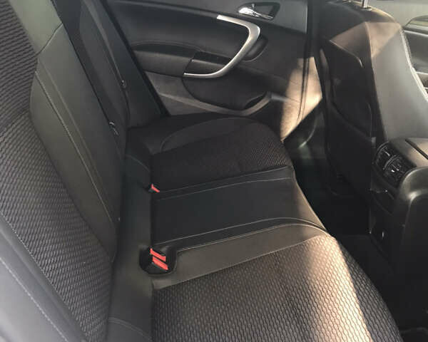 Білий Опель Інсігнія, об'ємом двигуна 2 л та пробігом 210 тис. км за 10800 $, фото 23 на Automoto.ua