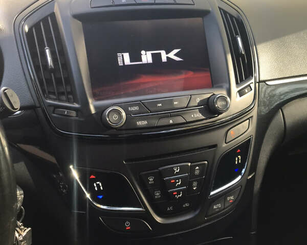 Білий Опель Інсігнія, об'ємом двигуна 2 л та пробігом 210 тис. км за 10800 $, фото 30 на Automoto.ua