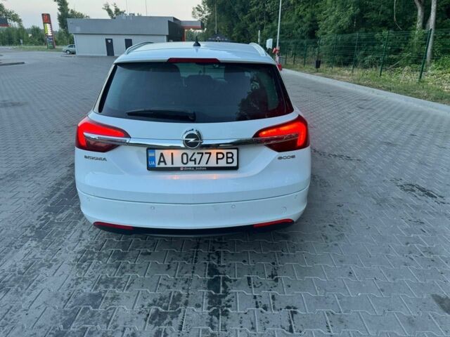 Білий Опель Інсігнія, об'ємом двигуна 2 л та пробігом 308 тис. км за 8500 $, фото 2 на Automoto.ua