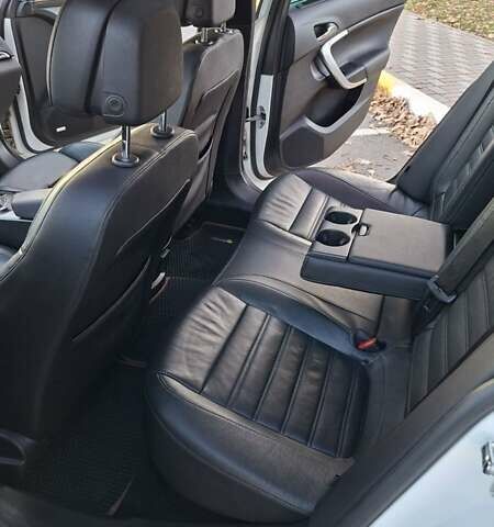 Белый Опель Инсигния, объемом двигателя 1.96 л и пробегом 246 тыс. км за 12800 $, фото 23 на Automoto.ua