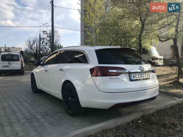 Білий Опель Інсігнія, об'ємом двигуна 2 л та пробігом 210 тис. км за 10800 $, фото 8 на Automoto.ua