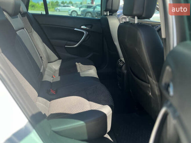 Білий Опель Інсігнія, об'ємом двигуна 2 л та пробігом 334 тис. км за 9150 $, фото 24 на Automoto.ua