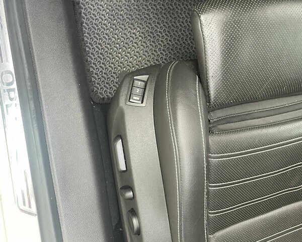 Белый Опель Инсигния, объемом двигателя 2.01 л и пробегом 201 тыс. км за 13500 $, фото 29 на Automoto.ua