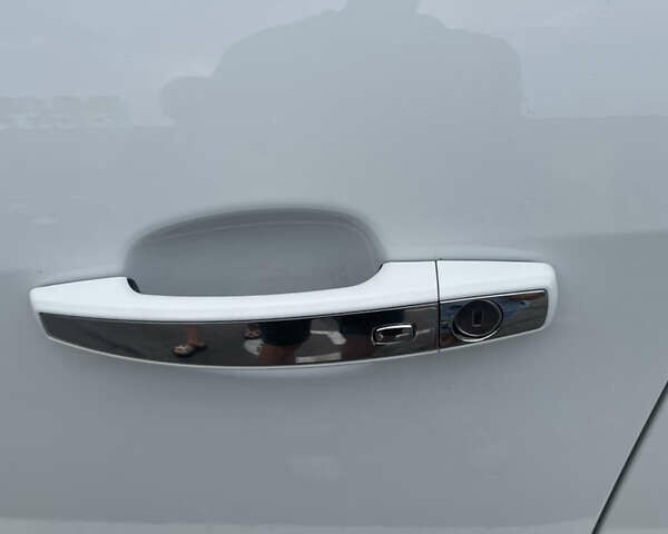 Білий Опель Інсігнія, об'ємом двигуна 2 л та пробігом 200 тис. км за 12500 $, фото 30 на Automoto.ua