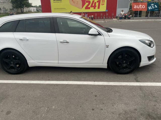 Білий Опель Інсігнія, об'ємом двигуна 2 л та пробігом 200 тис. км за 12500 $, фото 36 на Automoto.ua