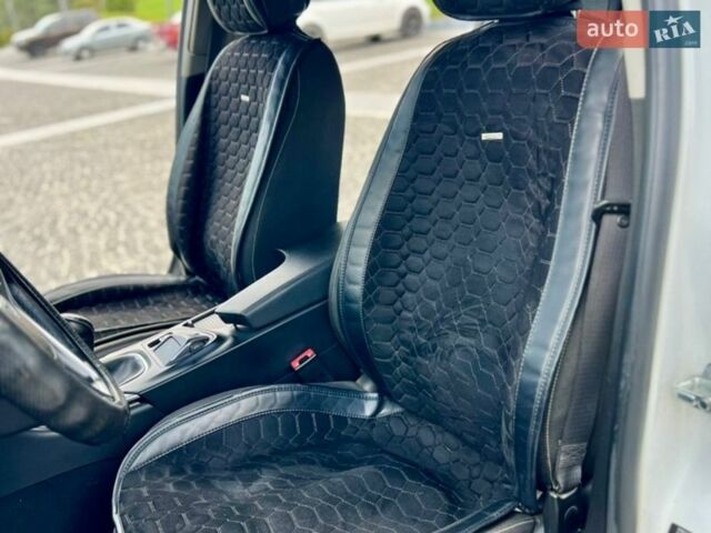 Белый Опель Инсигния, объемом двигателя 1.96 л и пробегом 228 тыс. км за 9300 $, фото 26 на Automoto.ua