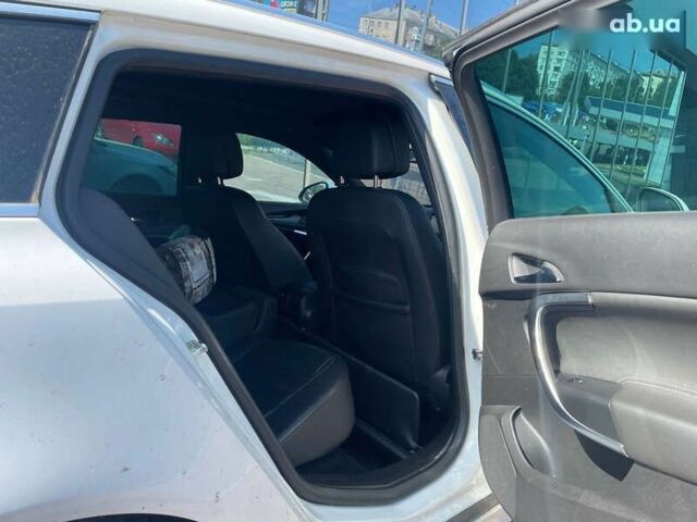 Белый Опель Инсигния, объемом двигателя 2 л и пробегом 297 тыс. км за 10700 $, фото 19 на Automoto.ua