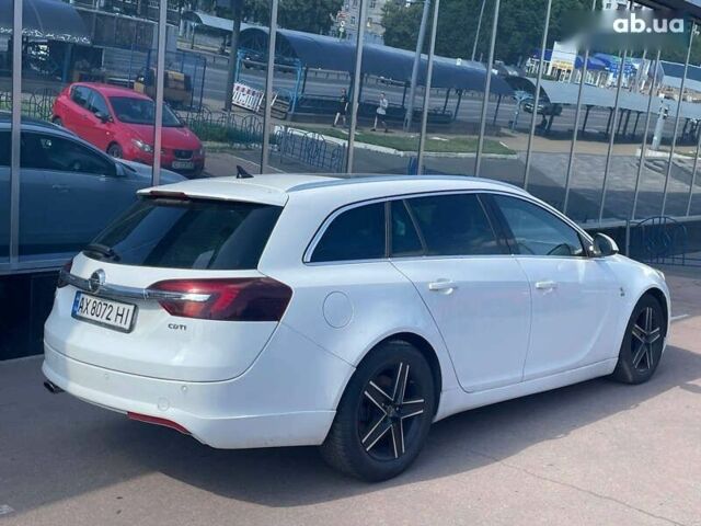 Белый Опель Инсигния, объемом двигателя 2 л и пробегом 297 тыс. км за 10700 $, фото 4 на Automoto.ua