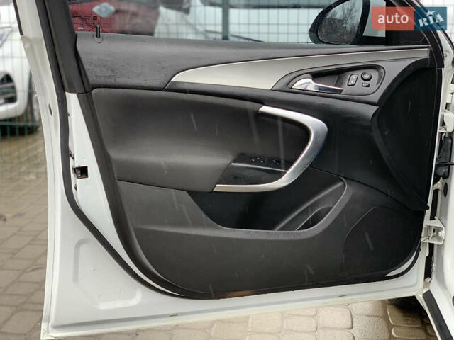 Белый Опель Инсигния, объемом двигателя 2 л и пробегом 179 тыс. км за 9399 $, фото 22 на Automoto.ua