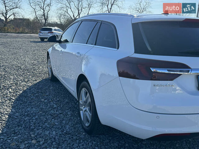 Білий Опель Інсігнія, об'ємом двигуна 1.96 л та пробігом 278 тис. км за 10000 $, фото 27 на Automoto.ua