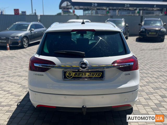 Белый Опель Инсигния, объемом двигателя 2 л и пробегом 321 тыс. км за 9999 $, фото 4 на Automoto.ua